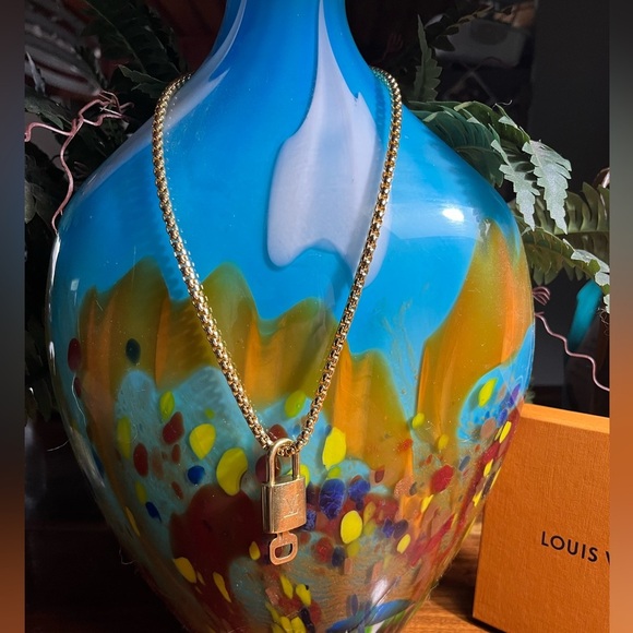 Louis Vuitton Gold lock and key No. 304 Necklace - Picture 1 of 10